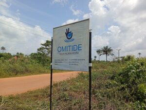 Omitide's Signpost at the office entrance