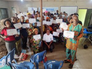 Farmers holding Certificate of Participation